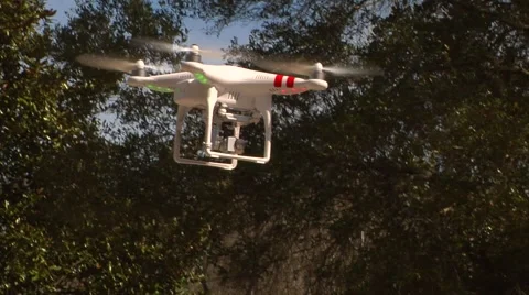 UAV-13, drone helicopter MCU low angle flys on windy day Stock Footage 47249481