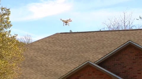 UAV-16, drone helicopter MWS, descends in front of house Stock Footage 47243671