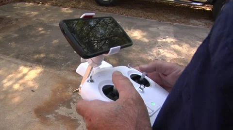 UAV-5, drone helicopter, licensed pilot OSS, joystick controller, pilots hands Stock Footage 47277363
