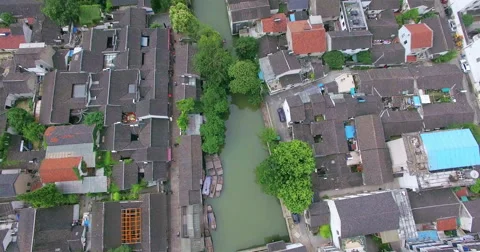 UAV aerial view of Tile-roofed house and river in Suzhou, China Stock Footage 65966530