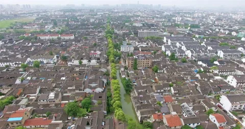 UAV aerial view of Tile-roofed house and river in Suzhou, China Video stock 65966899