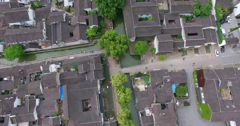 UAV aerial view of Tile-roofed house and river in Suzhou, China Stock Footage 65966988