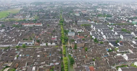 UAV aerial view of Tile-roofed house and river in Suzhou, China Stock-Footage 65967391