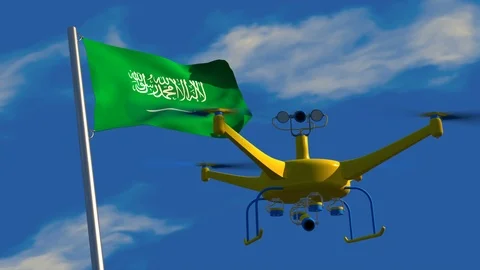 UAV drone watching a Saudi Arabian flag waving in the wind Stock Footage