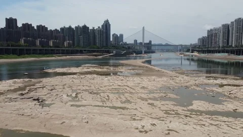 UAV flies on the drought river 스톡 동영상 225413299