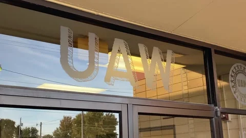 UAW - United Auto Workers - Logo on Glass Above Door Stock Footage 221265653