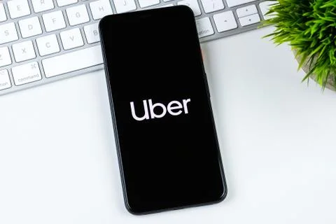 Uber app logo on a smartphone screen Stock Photos