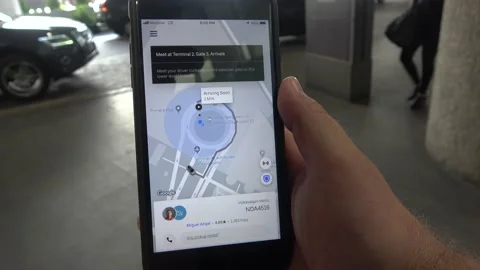 Uber App On Phone Screen At Benito Juarez International Airport, Mexico City Stock Footage 154543822