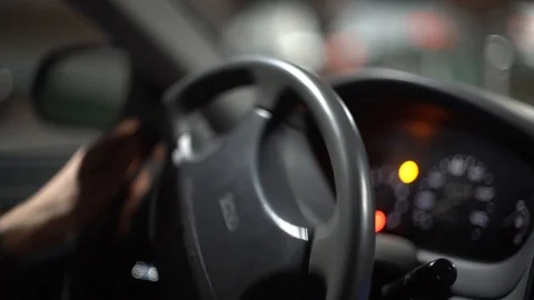 Uber Driver Turning Around in Parking Lot at Night Before Delivery - Stock Footage 96285977