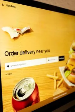 Uber eats app displaying food delivery service interface Fotos de archivo