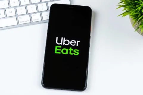 Uber Eats app logo on a smartphone screen Stock Photos