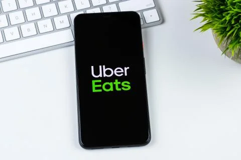 Uber Eats app logo on a smartphone screen Stock Photos