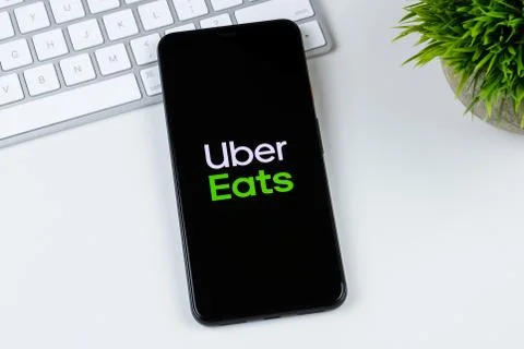 Uber Eats app logo on a smartphone screen Stock Photos