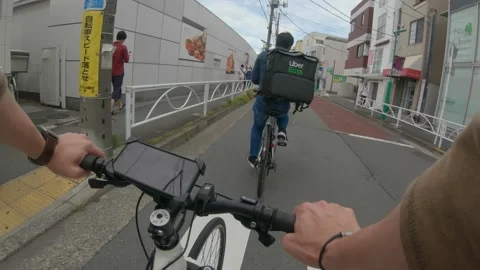 Uber Eats Delivery During The Coronavirus Pandemic As Demand Surges In Stock Footage 130245632
