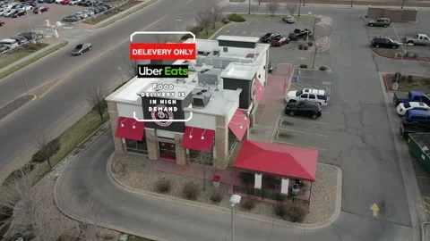 Uber Eats Delivery Only Motion Graphic displayed on top of aerial footage Stock Footage 145867170