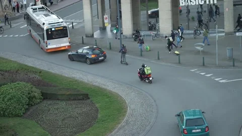 Uber Eats delivery rider driving with scooter at rush hour, 4K top down Stock Footage 149289146