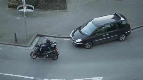 Uber Eats Food Delivery Man Driving A Scooter On City Road During The Stock Footage 149578237