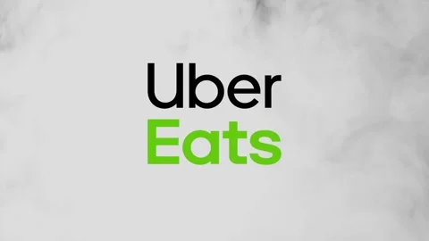 Uber Eats logo in the misty smoke. Concept of mystery around the company - Stock Footage 148357379