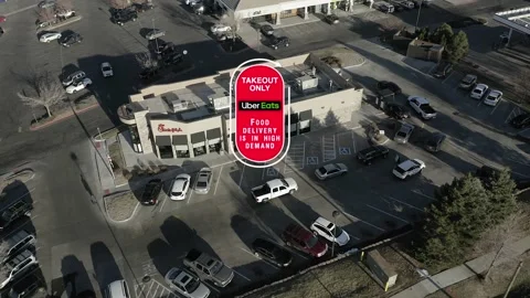 Uber Eats Takeout Only Motion Graphic displayed on top of aerial footage Stock Footage 145867183
