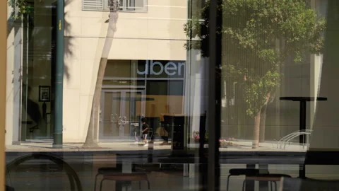 Uber logo on the corporate office headquarters in San Francisco, California Stock Footage 250005657