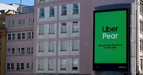 Uber Pear from Uber Eats, London, United Kingdom Stock Footage 250226268