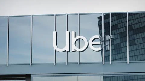 Uber Stock data presented on the logo of the office facade editorial Stock Photos