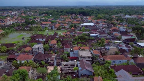 Ubud city showing rooftops and lush Bali landscape. Nice aerial view drone Stock Footage 344620356