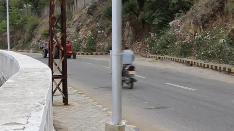 Udaipur, India, 17.7. 2015. A tractor running on road in Udaipur. Stock Footage 154681339