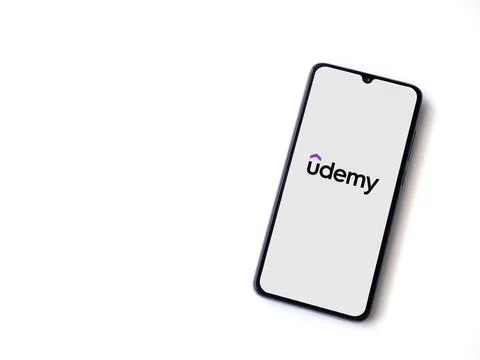 Udemy app launch screen on smartphone on white background Foto stock