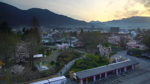 Ueda Castle with Cherry Blossoms and the Mountains of Asahi and Eboshidake Video stock 330767182