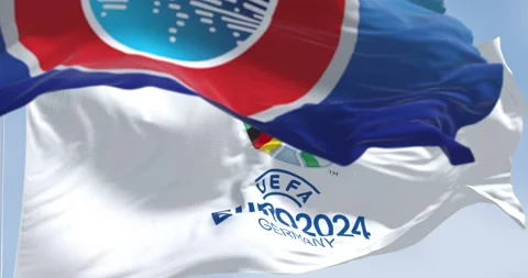 UEFA and UEFA Euro 2024 flags flying in ... | Stock Video | Pond5