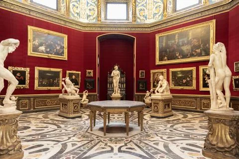 Uffizi Palace in Florence - Firenze, Italy. Ancient statue in Tribuna room. Stock Photos
