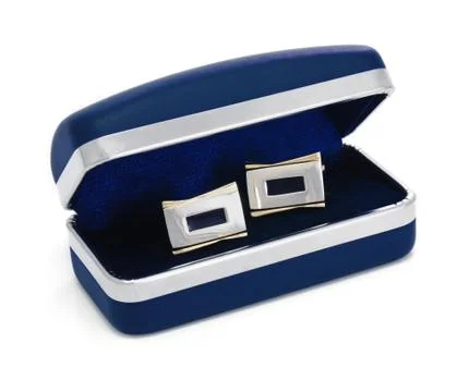 ?ufflinks on the blue box Stock Photos