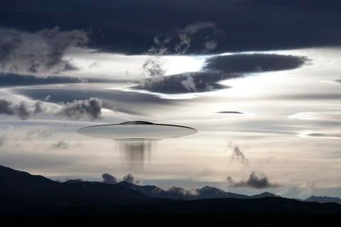 UFO in clouds Stock Photos