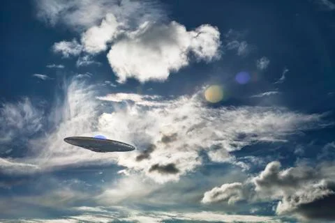 UFO in the clouds Foto stock