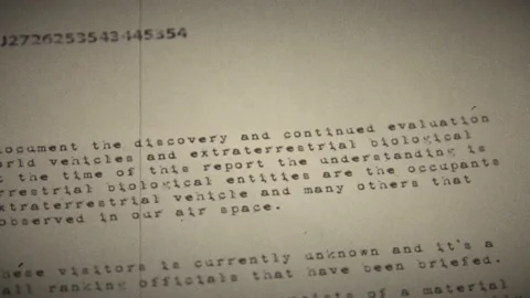 UFO files on a table with photographs Stock Footage 155452138