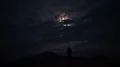 The UFO flight above the man in the dark background 4k or 4k+ Resolution