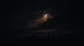 The UFO flight above a man in the dark background 4k or 4k+ Resolution