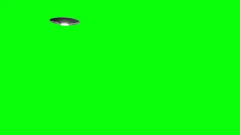 UFO Flying saucer flying from left into the distance on green screen Stock Footage