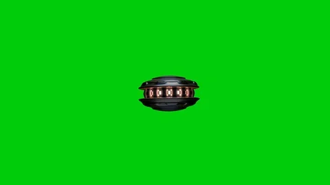 UFO green screen turning fast and flying Stock Footage 125630859