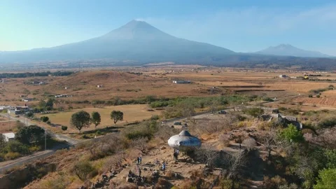 UFO on hill with Volcano Background Video stock 148785264