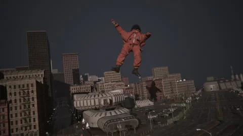The UFO pulls the astronaut against gravity to float him Stock Footage 287488432