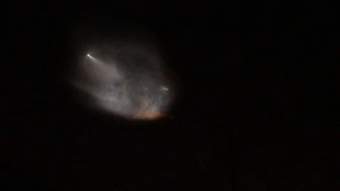 UFO Rocket Ship Flares Through the Night Sky Stock Footage 129862779