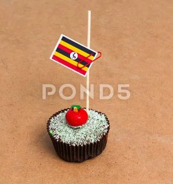 Uganda flag on an cupcake Stock Photos