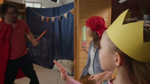 UGC of Young Princess Reporting on Sword Fight during Home Theater Show Stock Footage 307348077