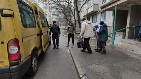 Ugledar, 20.04.20 – Evacuation of elderly people by volunteer bus Stock Footage 317218122