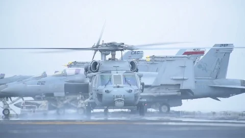 UH-60 Sea Hawk taking off from flight deck of USS Theodore Roosevelt Stock Footage 108535354