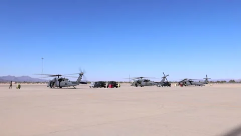 UH60 Blackhawks Prepare for Take Off Stock Footage 154269306