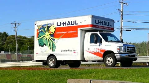 UHaul rental moving van on highway Stock Footage
