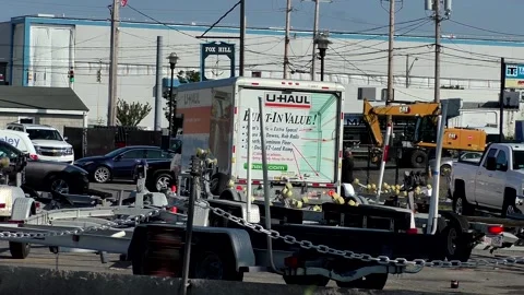 UHaul van backs into boat yard parking area Video stock 219755686